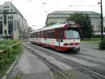 Ein DWAG-GT8S der Rheinbahn ist am 11.06.2004 am Jan-Wellem-Platz in Dsseldorf unterwegs.