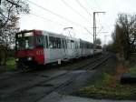 Eine Doppeltraktion aus Stadtbahnwagen B der Rheinbahn ist am 22.11.2004 in Dsseldorf-Froschenteich unterwegs.