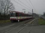 Eine Doppeltraktion aus Stadtbahnwagen B der Rheinbahn ist am 13.02.2004 auf dem Weg nach Krefeld in Dsseldorf-Lrick unterwegs.